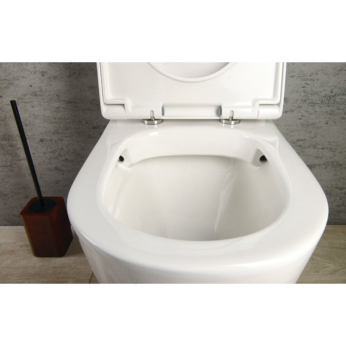 The SAPHO Turku Rimless unit with a slow-closing lid is being installed.
