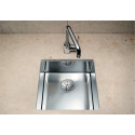 Under the countertop, a BLANCO CLARON 550-IF sink is installed, 59x44 cm.